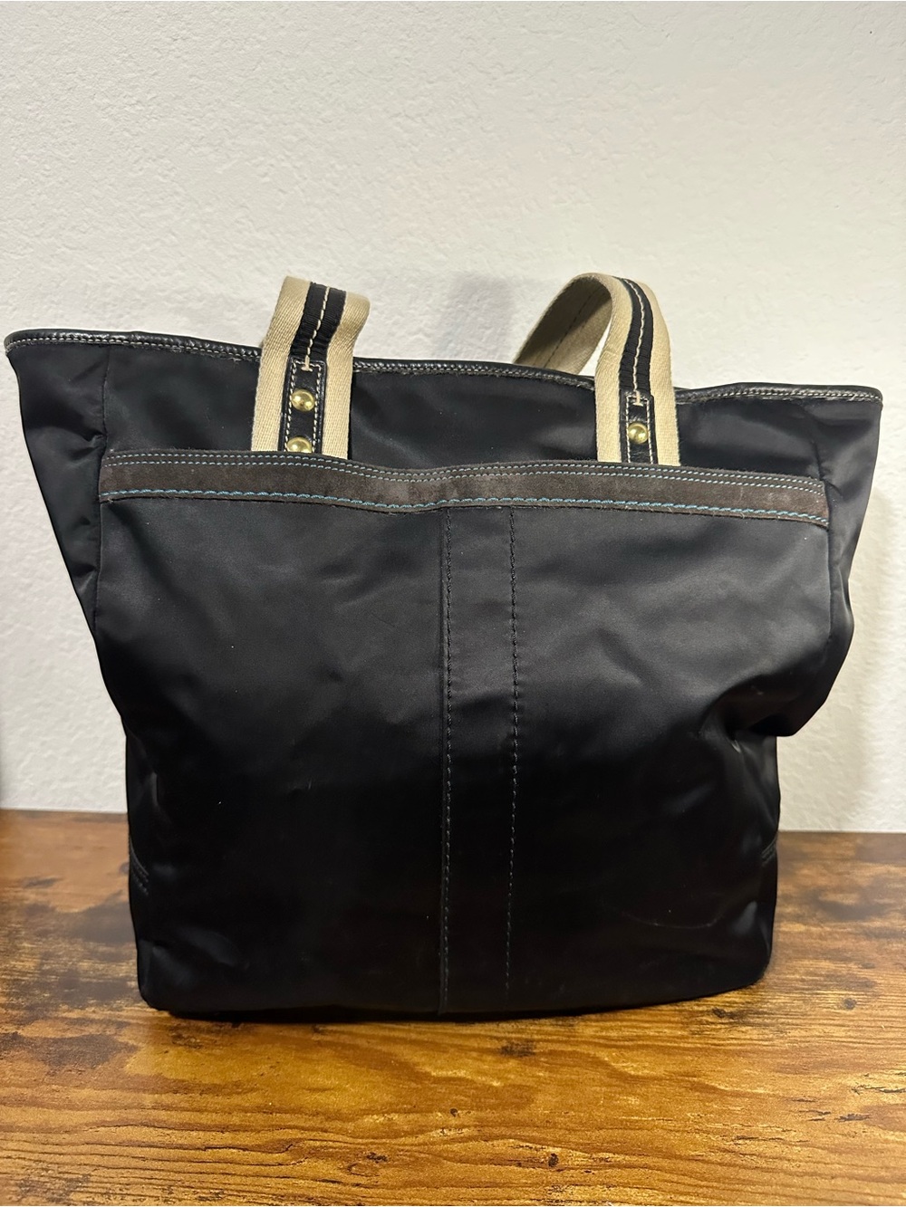 Coach Black Tote with Cream Striped Handles and Gold Rivets
